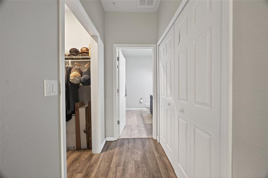 3415 West Anthony Road, Unit 303 Ocala, FL 34475 - Photo 18 of 29 a view of a hallway with wooden floor
