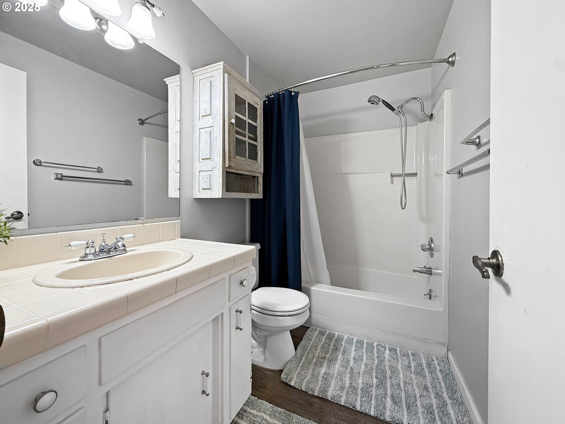1330 Crissey Circle Brookings, OR 97415 - Photo 22 of 42 a bathroom with a sink toilet vanity and shower