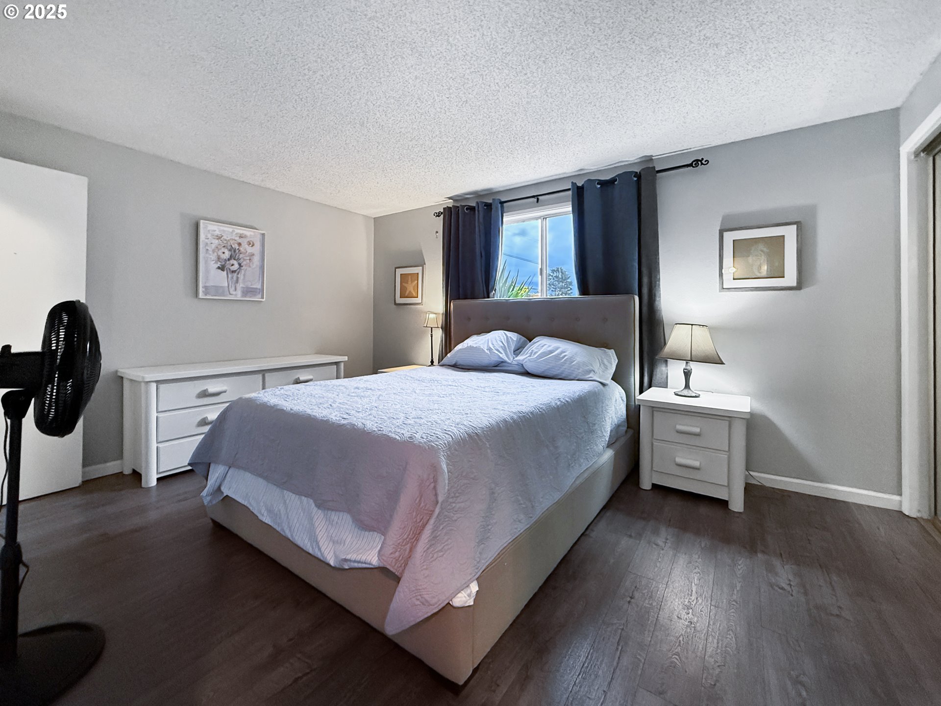 1330 Crissey Circle Brookings, OR 97415 - Photo 25 of 42 a bedroom with a bed and a night stand