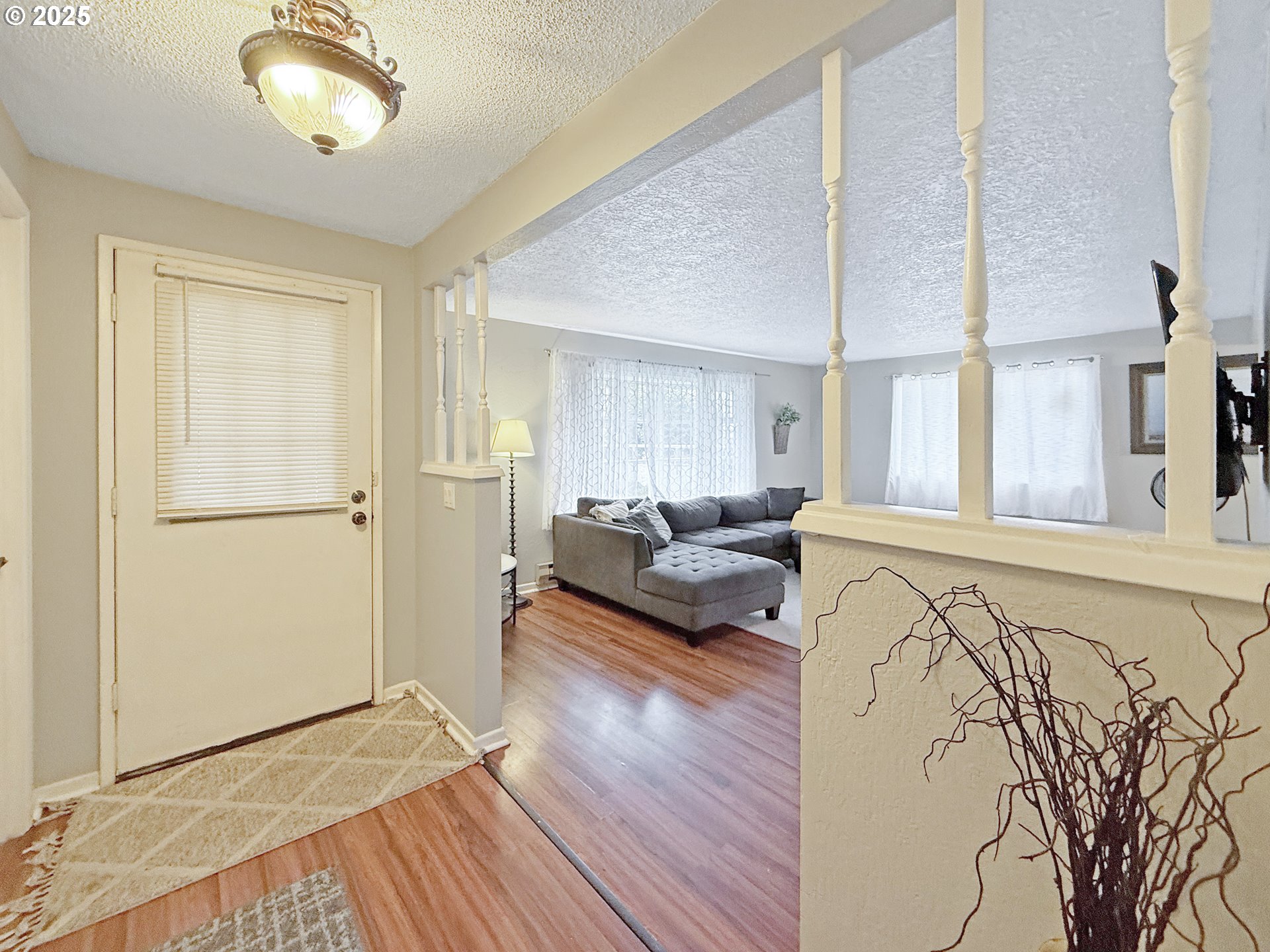 1330 Crissey Circle Brookings, OR 97415 - Photo 3 of 42 a living room with furniture and a wooden floor