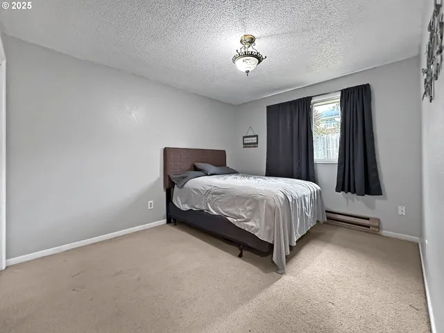 a bedroom with a bed and closet