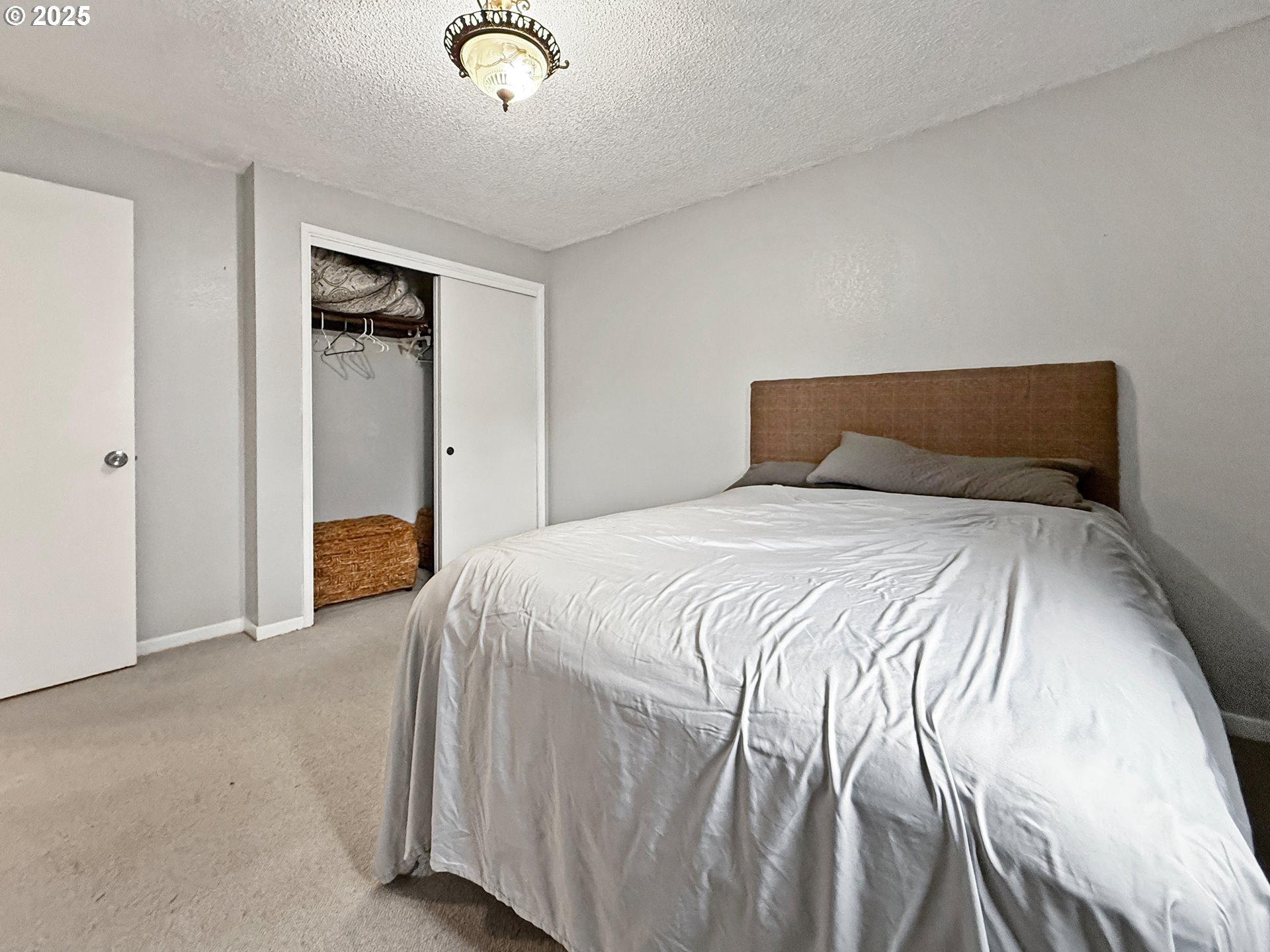 1330 Crissey Circle Brookings, OR 97415 - Photo 33 of 42 a bedroom with a bed and closet