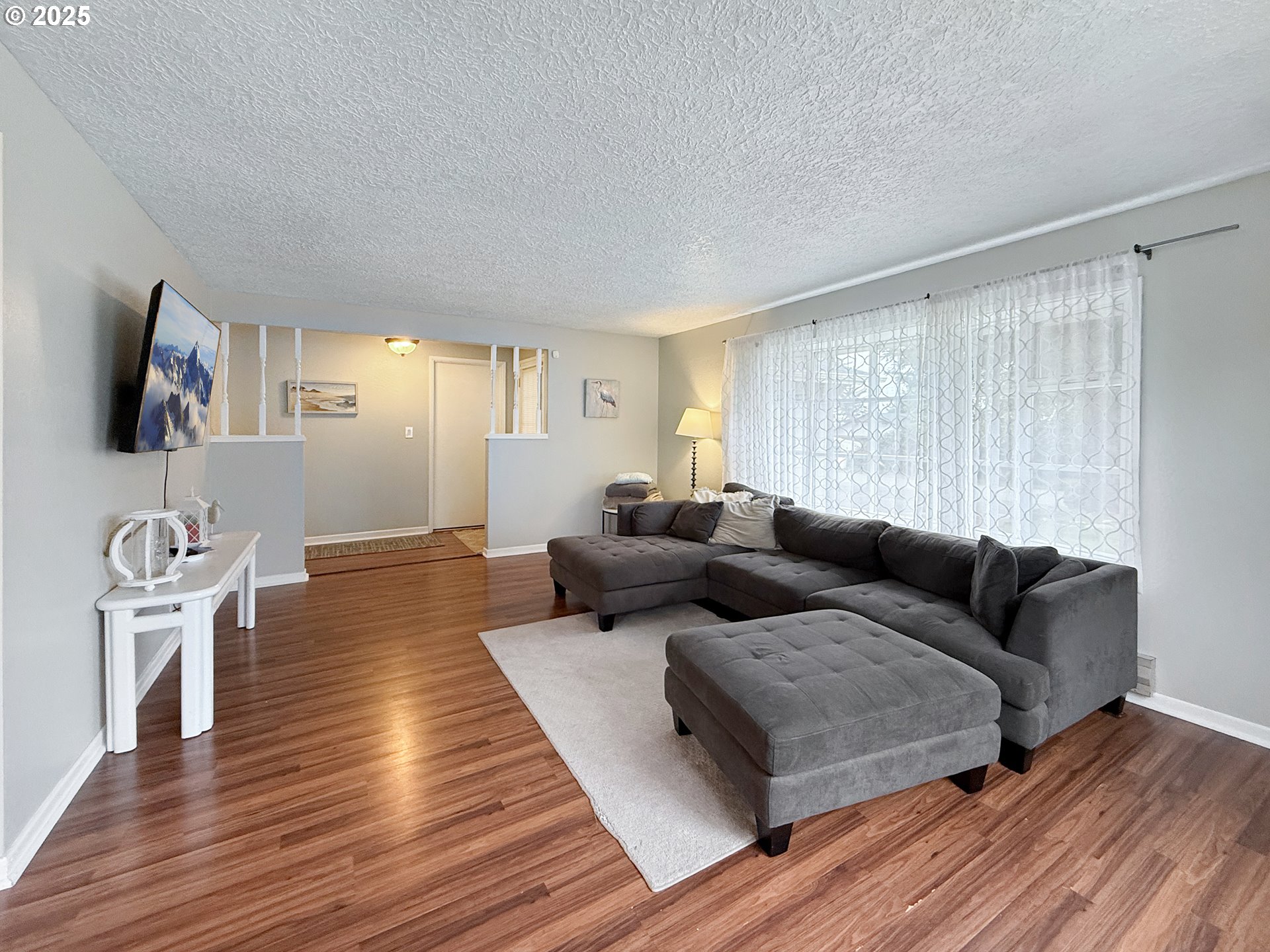 1330 Crissey Circle Brookings, OR 97415 - Photo 8 of 42 a living room with furniture and a flat screen tv