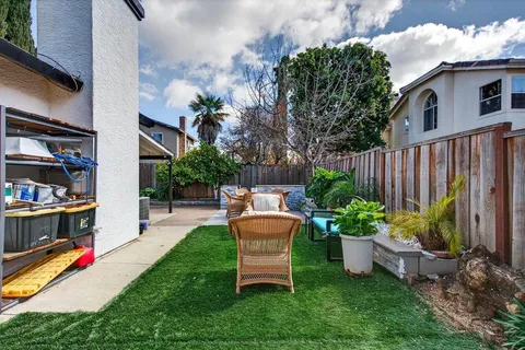 a garden view with a seating space