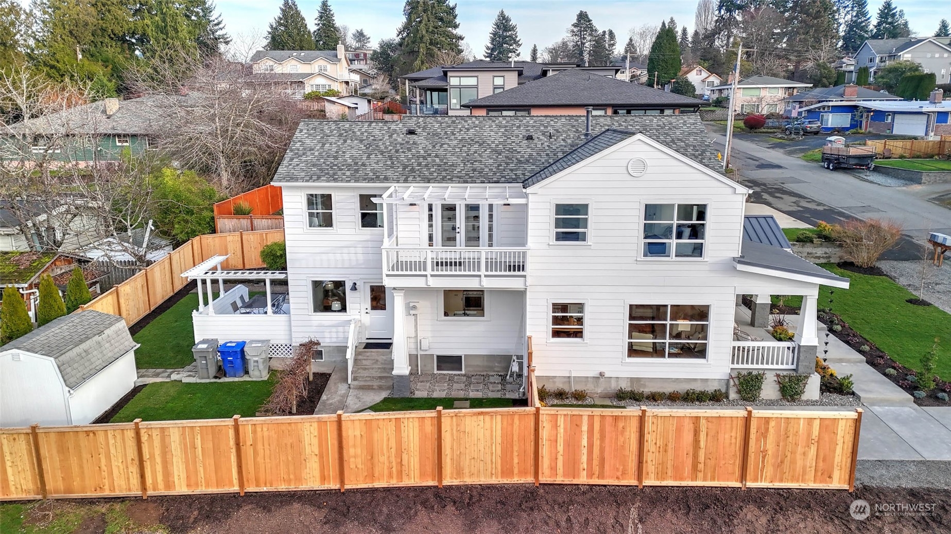 1018 North 34th Street Renton, WA 98056 - Photo 2 of 40 a front view of a house with a yard