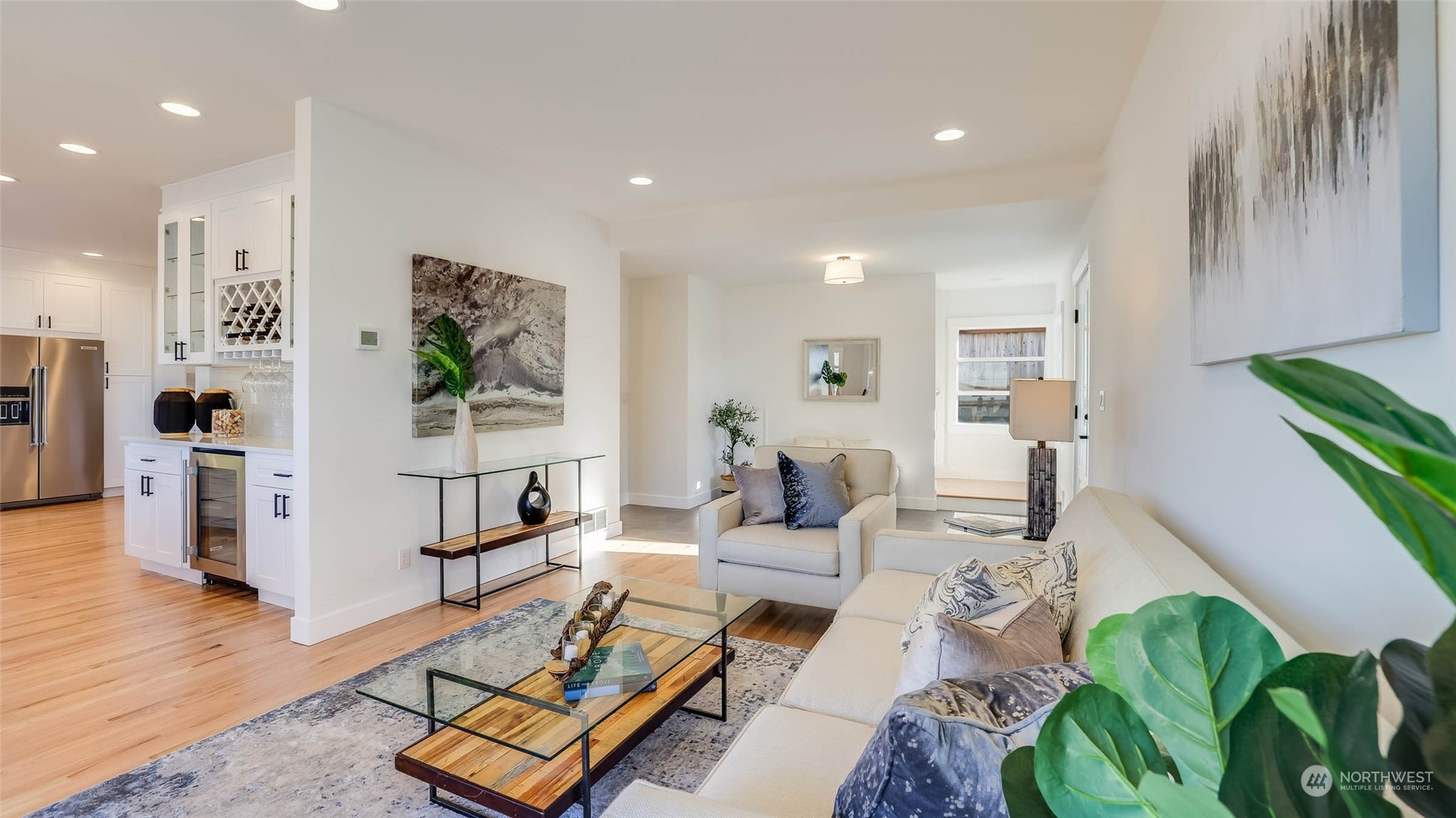 1018 North 34th Street Renton, WA 98056 - Photo 24 of 40 a living room with furniture rug and wooden floor