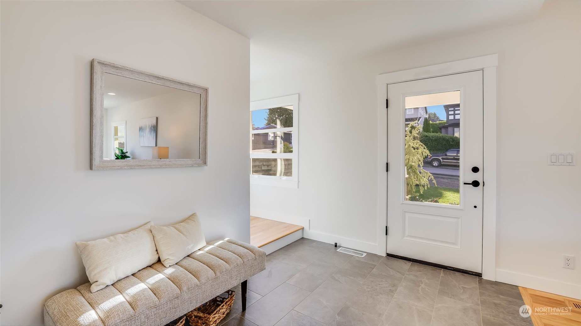 1018 North 34th Street Renton, WA 98056 - Photo 25 of 40 a living room with furniture and a window