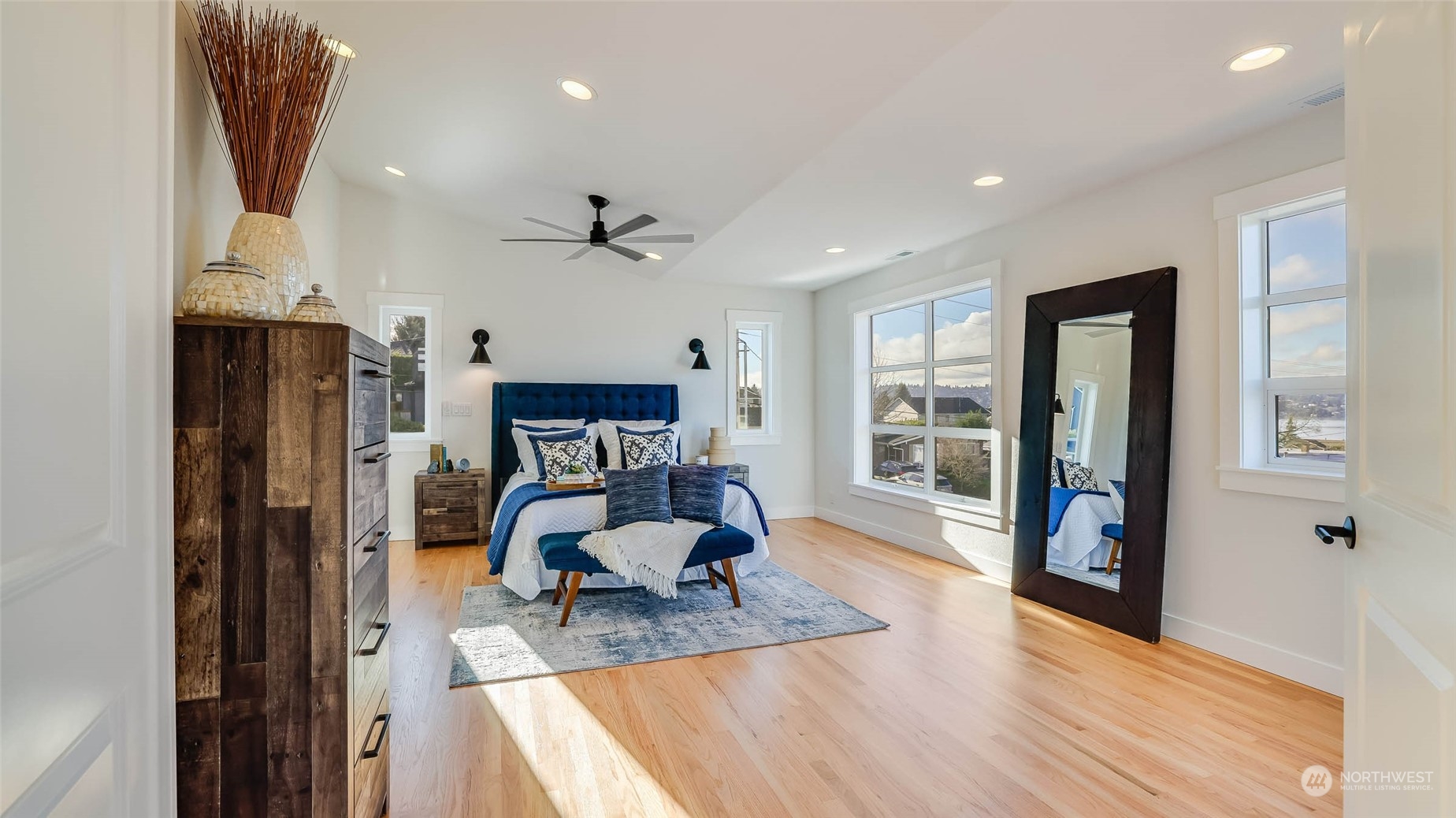 1018 North 34th Street Renton, WA 98056 - Photo 30 of 40 a living room with furniture and a wooden floor