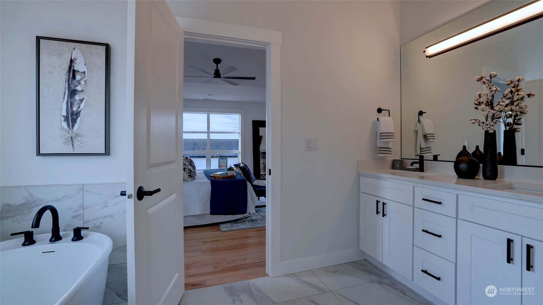1018 North 34th Street Renton, WA 98056 - Photo 33 of 40 a bathroom with a sink and a mirror