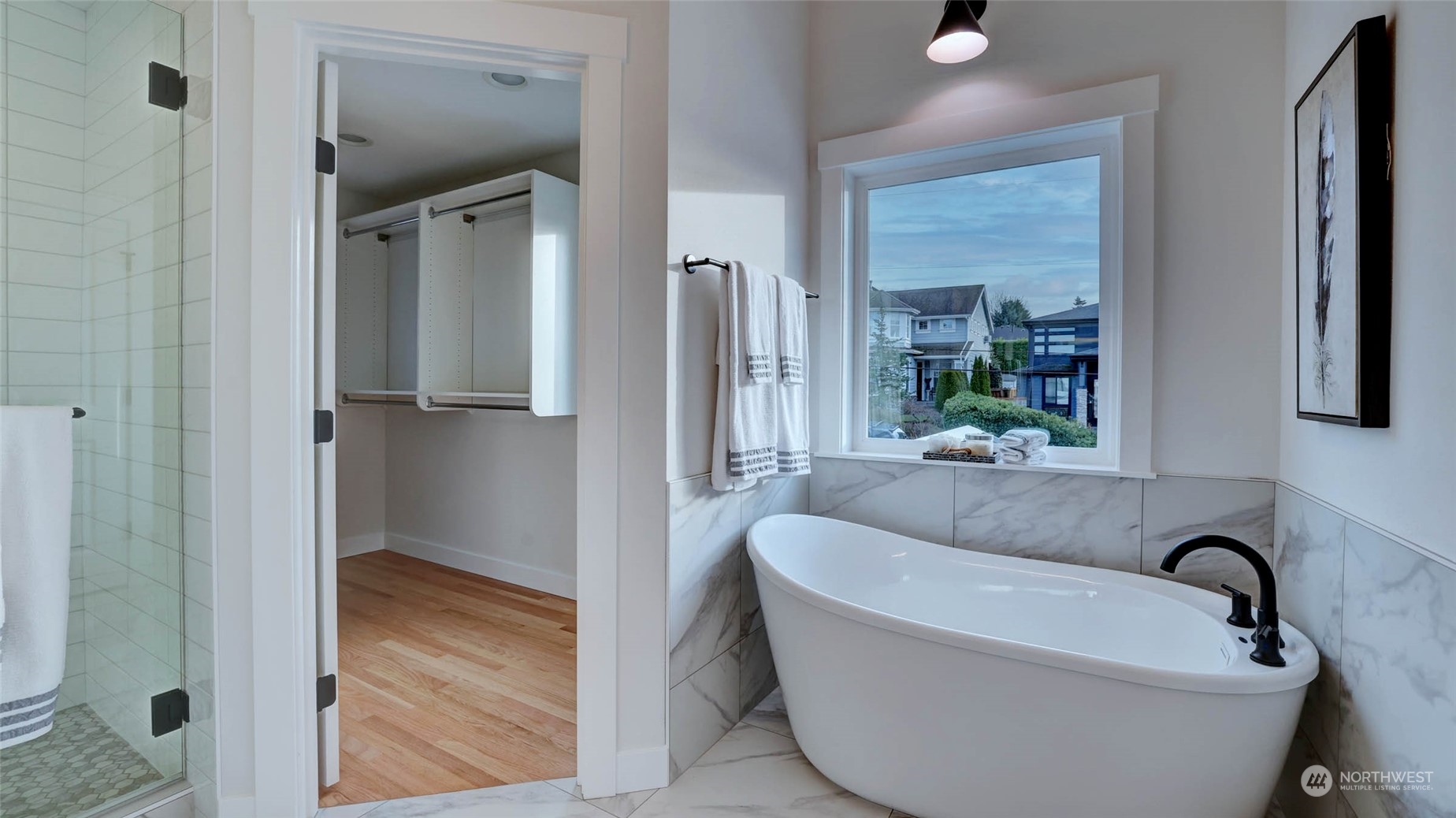 1018 North 34th Street Renton, WA 98056 - Photo 35 of 40 a bathroom with a bathtub and shower