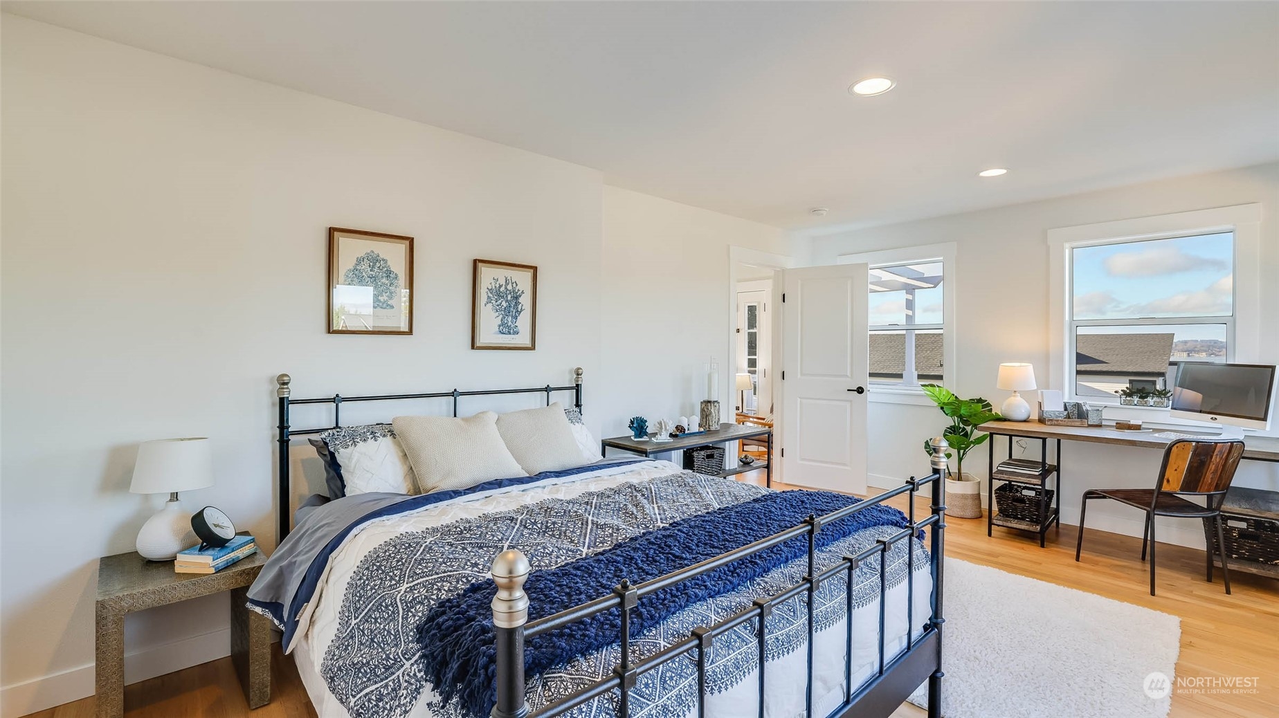 1018 North 34th Street Renton, WA 98056 - Photo 38 of 40 a bedroom with a bed and a table in it