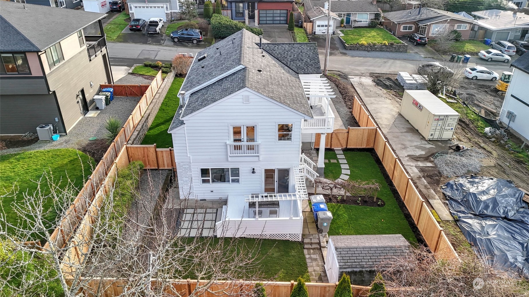 1018 North 34th Street Renton, WA 98056 - Photo 6 of 40 a aerial view of a house with a yard and potted plants