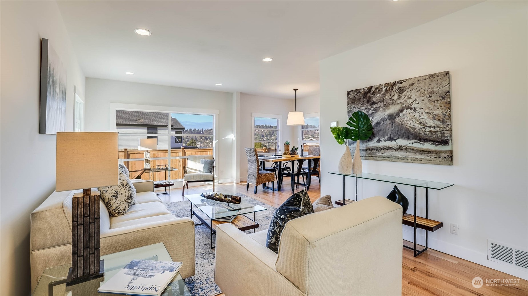 1018 North 34th Street Renton, WA 98056 - Photo 9 of 40 a living room with furniture and a painting on the wall