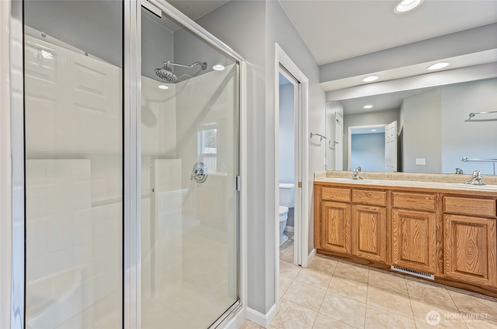1503 Castlerock Avenue Wenatchee, WA 98801 - Photo 24 of 37 a spacious bathroom with a shower and a sink