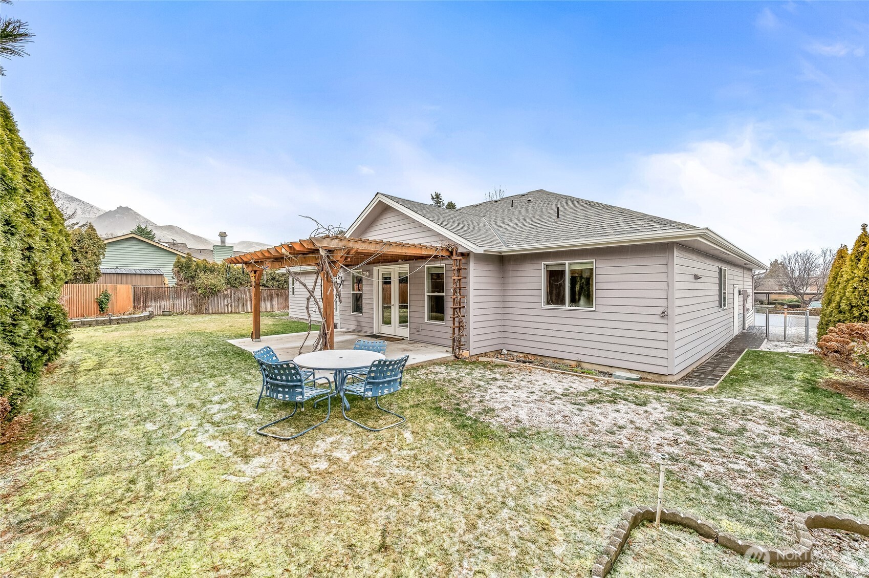 1503 Castlerock Avenue Wenatchee, WA 98801 - Photo 32 of 37 a front view of a house with a yard