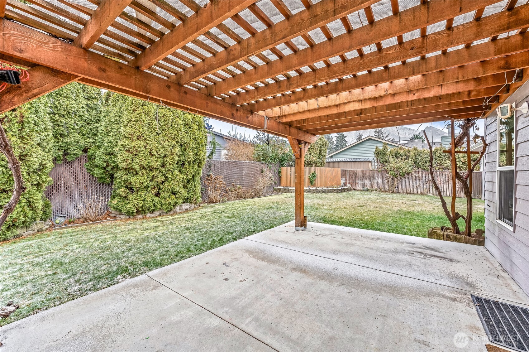 1503 Castlerock Avenue Wenatchee, WA 98801 - Photo 34 of 37 a porch with a yard