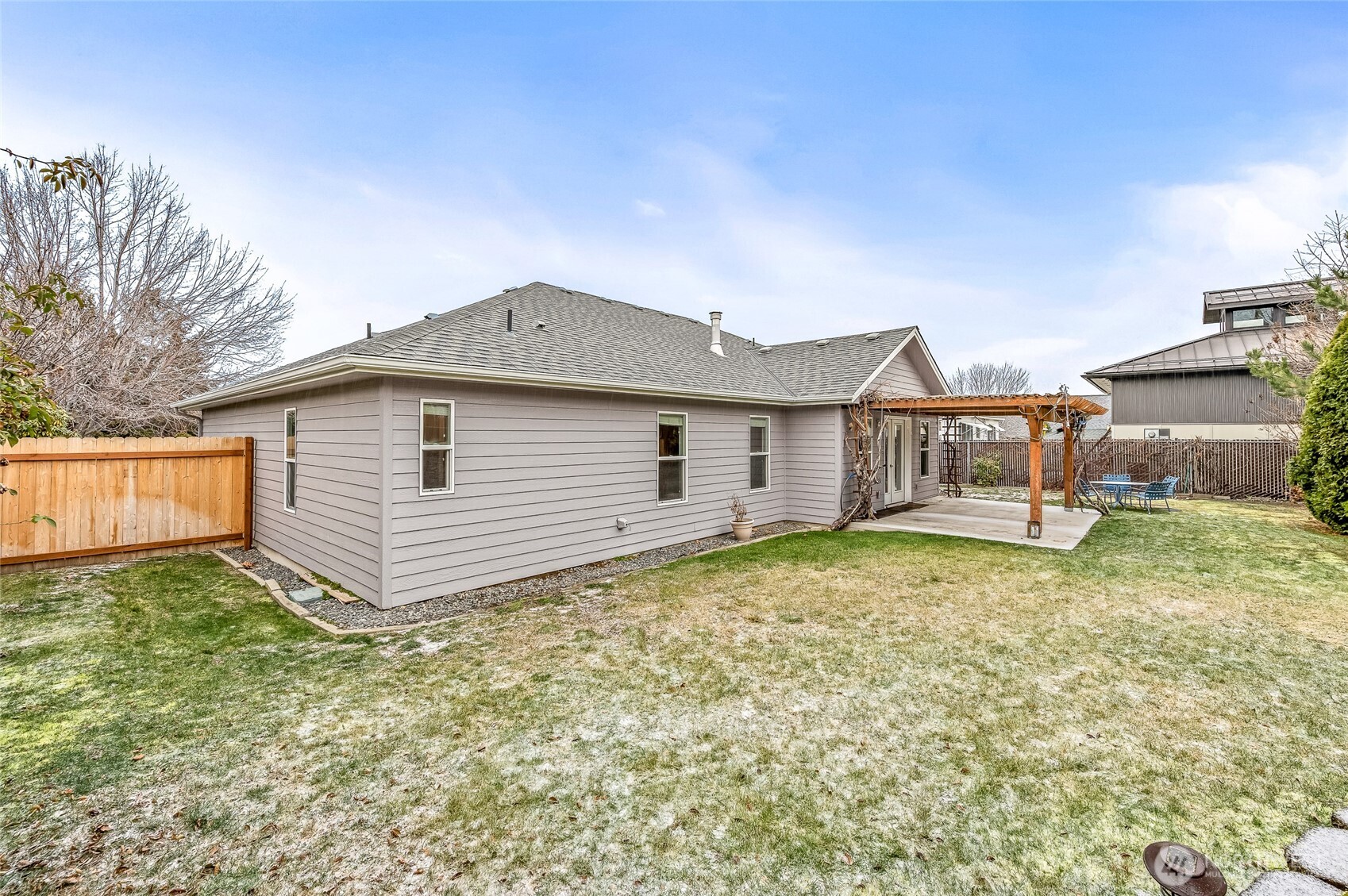 1503 Castlerock Avenue Wenatchee, WA 98801 - Photo 35 of 37 a view of a house with a yard
