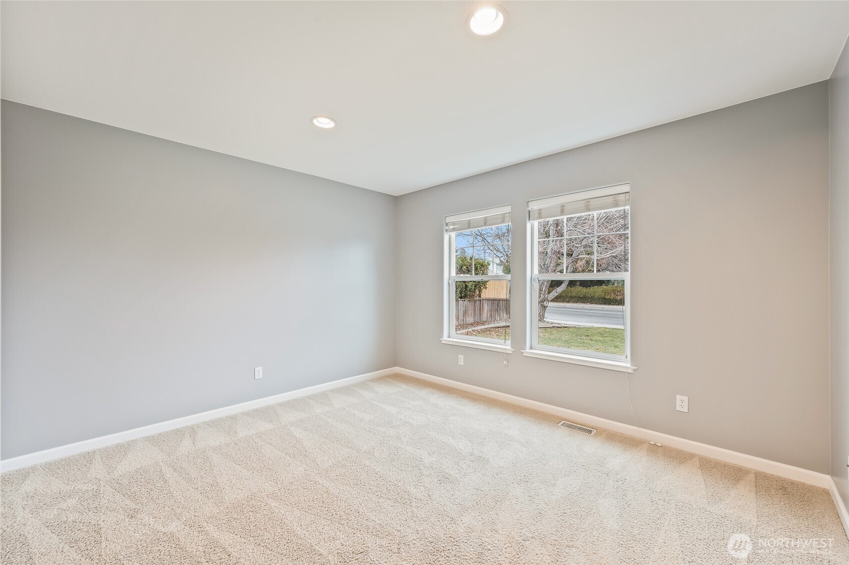 1503 Castlerock Avenue Wenatchee, WA 98801 - Photo 7 of 37 an empty room with a window