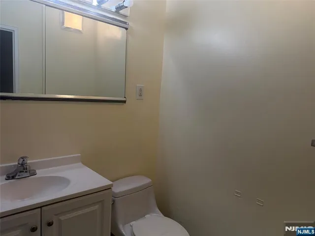 a bathroom with a sink and a toilet
