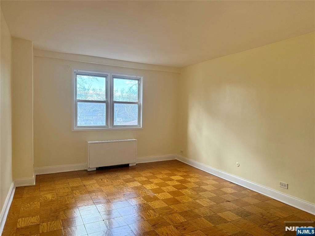 39 East 39th Street, Unit 3H Paterson, NJ 07514 - Photo 5 of 19 an empty room with a window