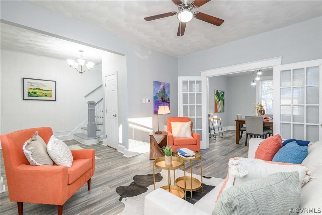 3103 Letcher Avenue Richmond, VA 23222 - Photo 12 of 50 a living room with furniture kitchen view and a chandelier
