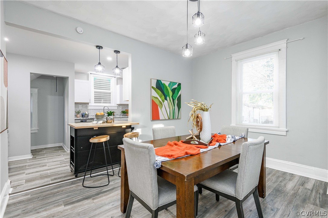 3103 Letcher Avenue Richmond, VA 23222 - Photo 17 of 50 a dining room with wooden floor and breakfast area