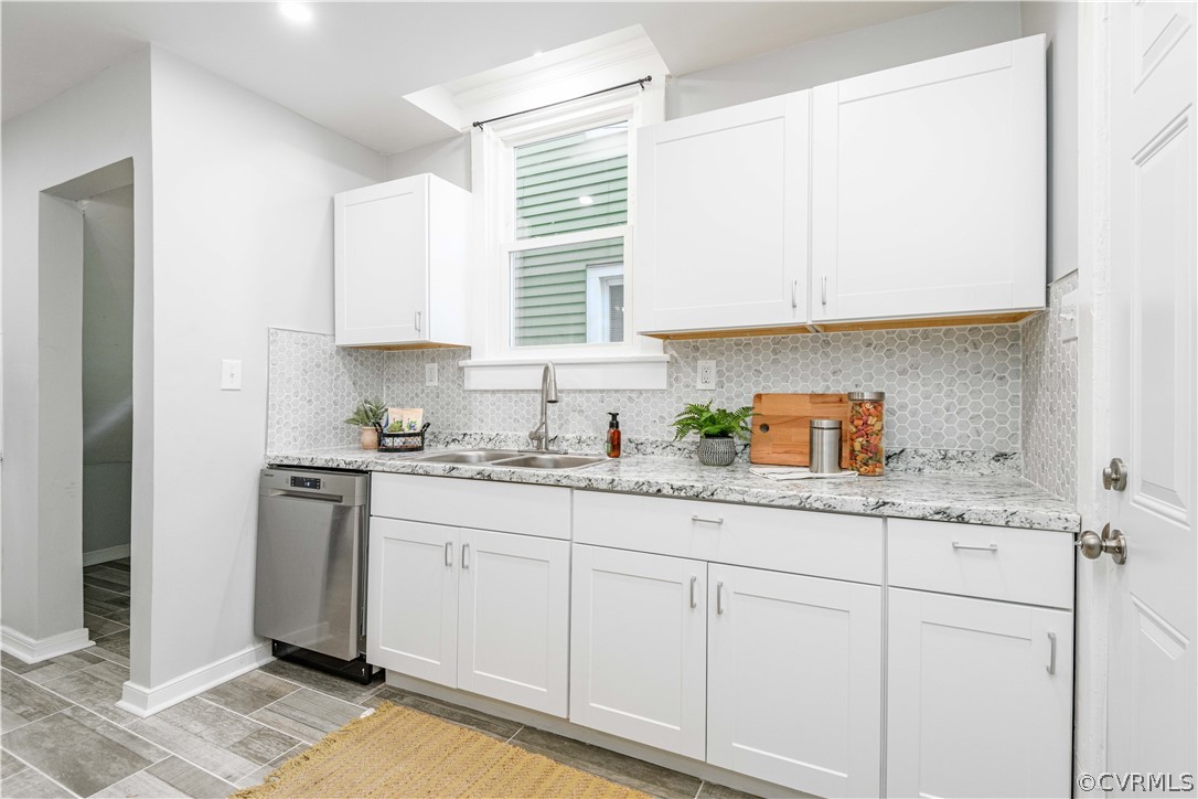3103 Letcher Avenue Richmond, VA 23222 - Photo 22 of 50 a kitchen with granite countertop white cabinets and white appliances