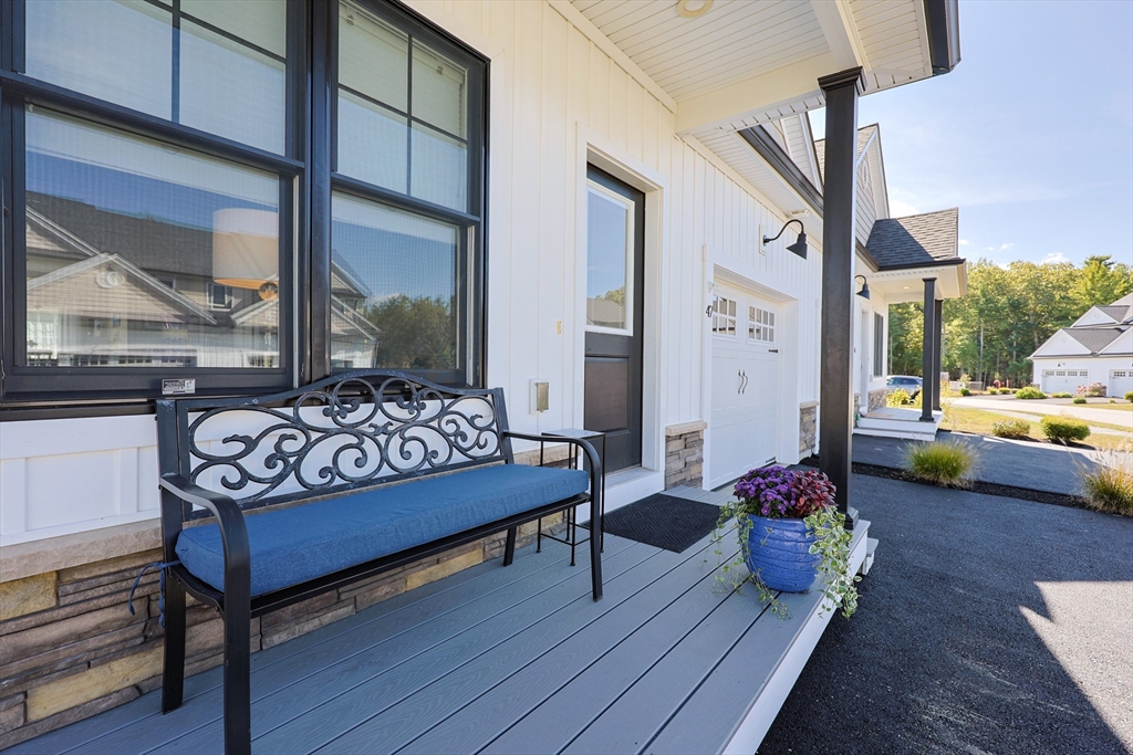 47 Compass Point Drive, Unit 47 Douglas, MA 01516 - Photo 2 of 32 a living room with furniture