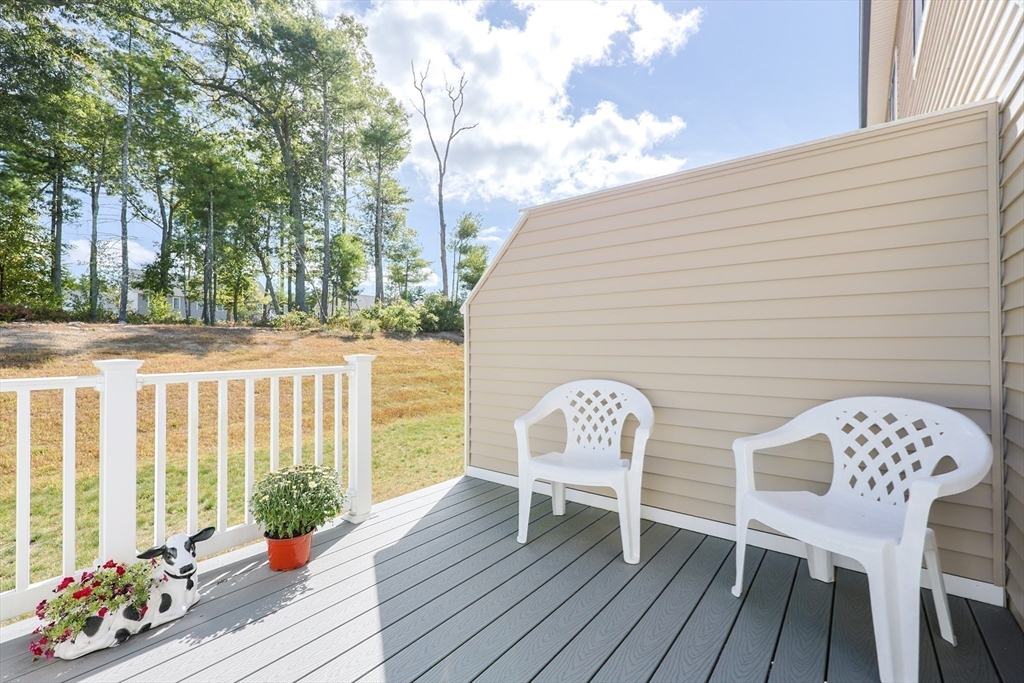 47 Compass Point Drive, Unit 47 Douglas, MA 01516 - Photo 29 of 32 a view of deck with patio