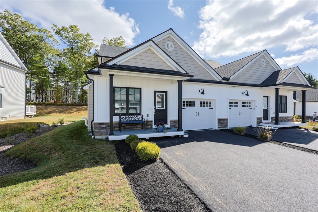 47 Compass Point Drive, Unit 47 Douglas, MA 01516 - Photo 32 of 32 a view of a house with backyard and sitting area