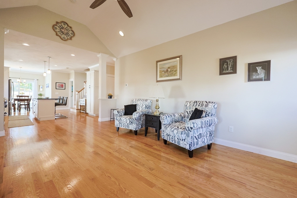 47 Compass Point Drive, Unit 47 Douglas, MA 01516 - Photo 4 of 32 a living room with furniture and a view of kitchen