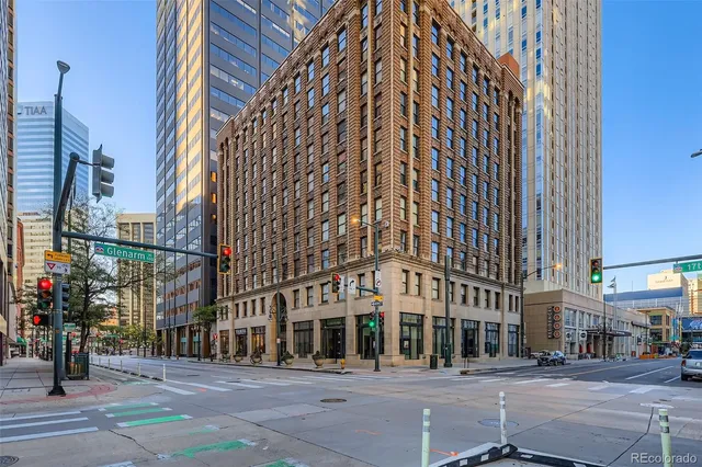 a view of a building with a street