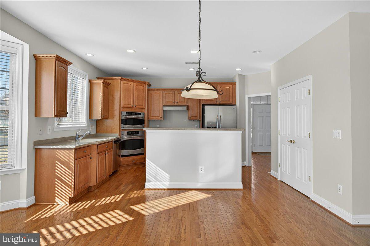 6159 Ferrier Court Gainesville, VA 20155 - Photo 13 of 74 Tons of Cabinets & Double Door Pantry!