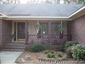 7775 Dragonhead Road Fayetteville, NC 28311 - Photo 4 of 12 a front view of a house