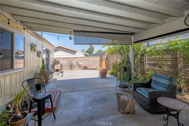 a outdoor living space with furniture and garden view