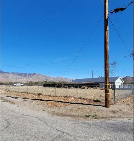 a view of a road with an ocean view