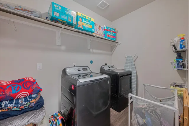 a utility room with dryer and washer