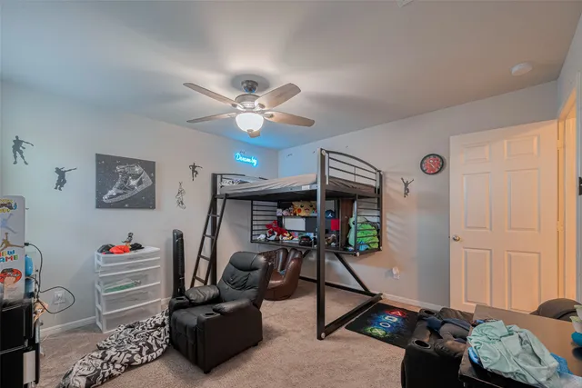 a room with gym equipment and a window