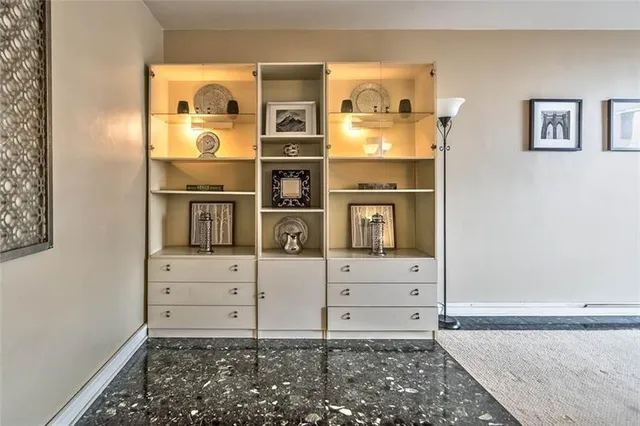 a view of walk in closet with window