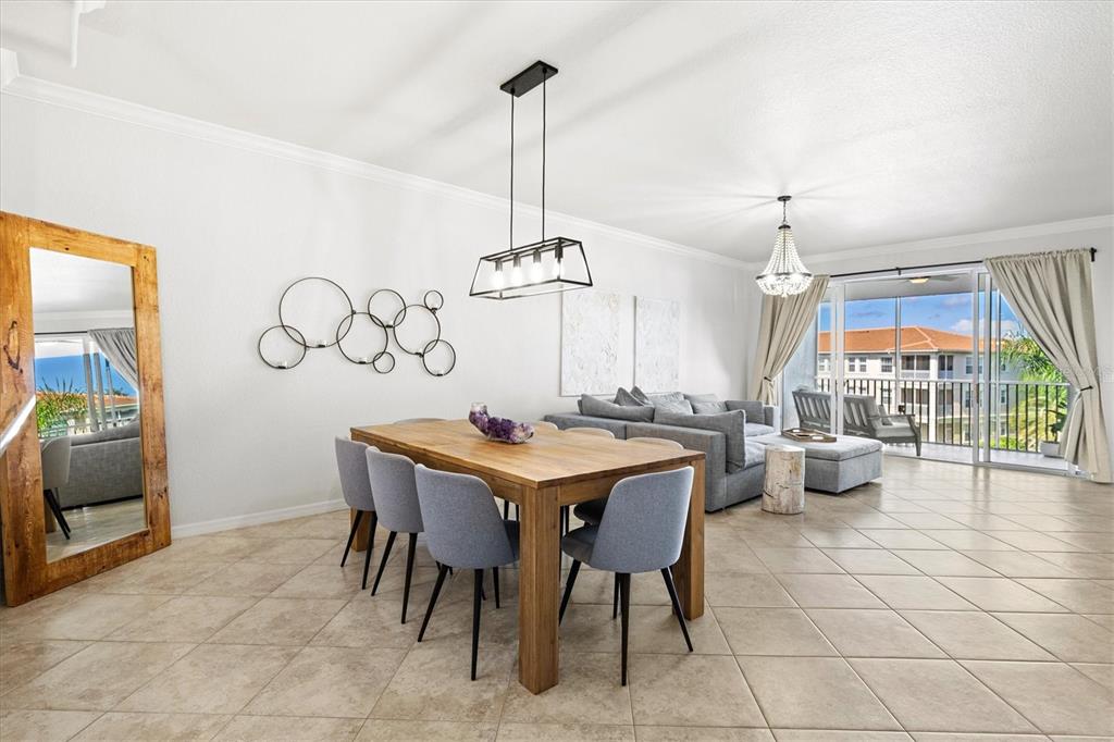 1000 San Lino Circle, Unit 1032 Venice, FL 34292 - Photo 13 of 88 a view of a dining room with furniture window and outside view