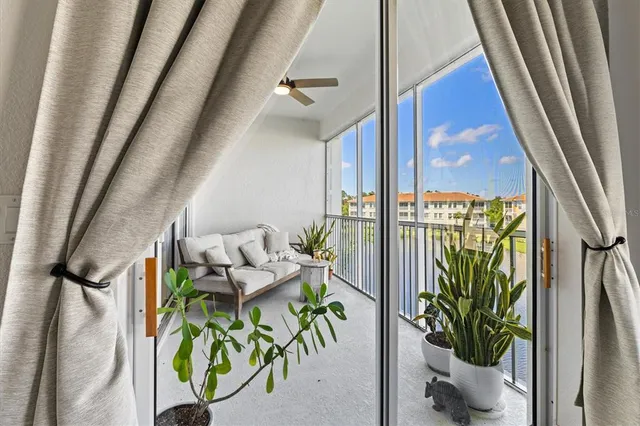 a view of a house with a garage and yard