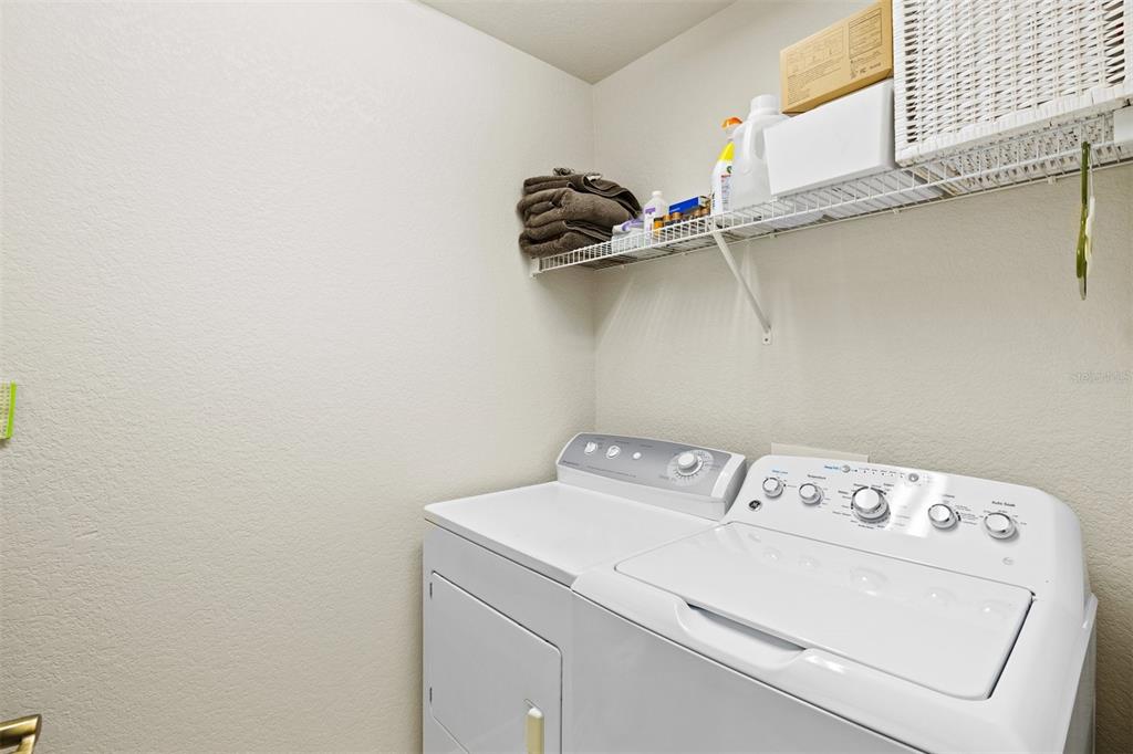 1000 San Lino Circle, Unit 1032 Venice, FL 34292 - Photo 37 of 88 a utility room with dryer and washer