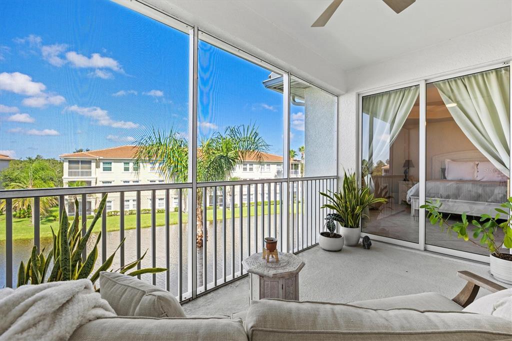 1000 San Lino Circle, Unit 1032 Venice, FL 34292 - Photo 39 of 88 a living room with furniture and a large window