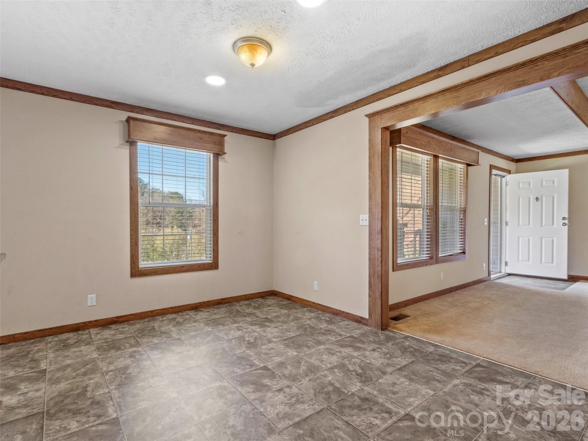 695 Johnson Farm Road Canton, NC 28716 - Photo 19 of 37 an empty room with windows