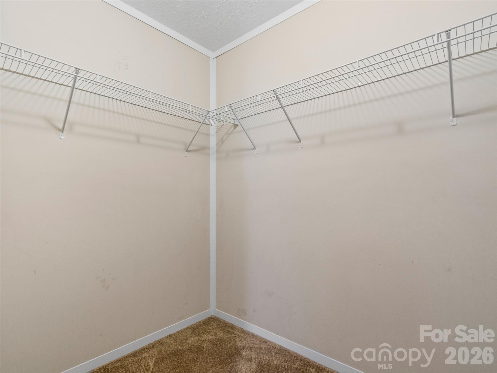 695 Johnson Farm Road Canton, NC 28716 - Photo 26 of 37 a view of a room with racks on the wall