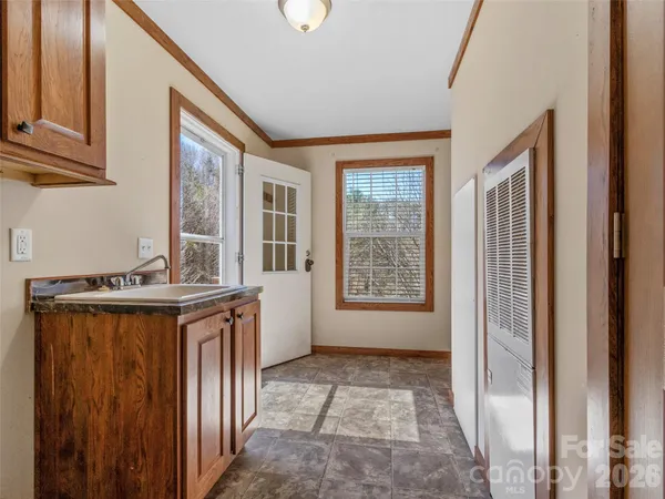 a view of a kitchen from the hallway