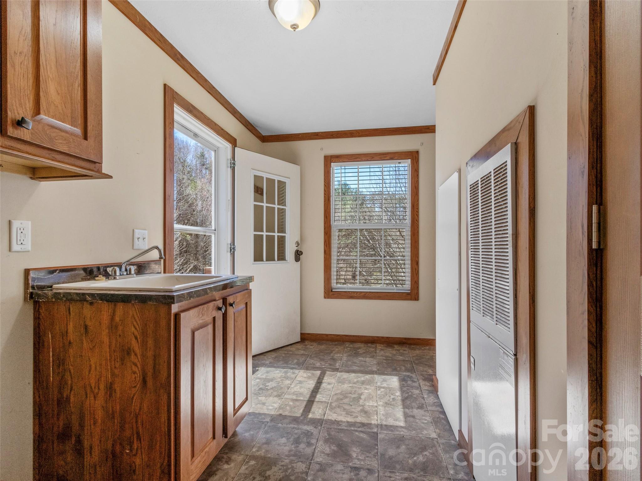 695 Johnson Farm Road Canton, NC 28716 - Photo 29 of 37 a view of a kitchen from the hallway