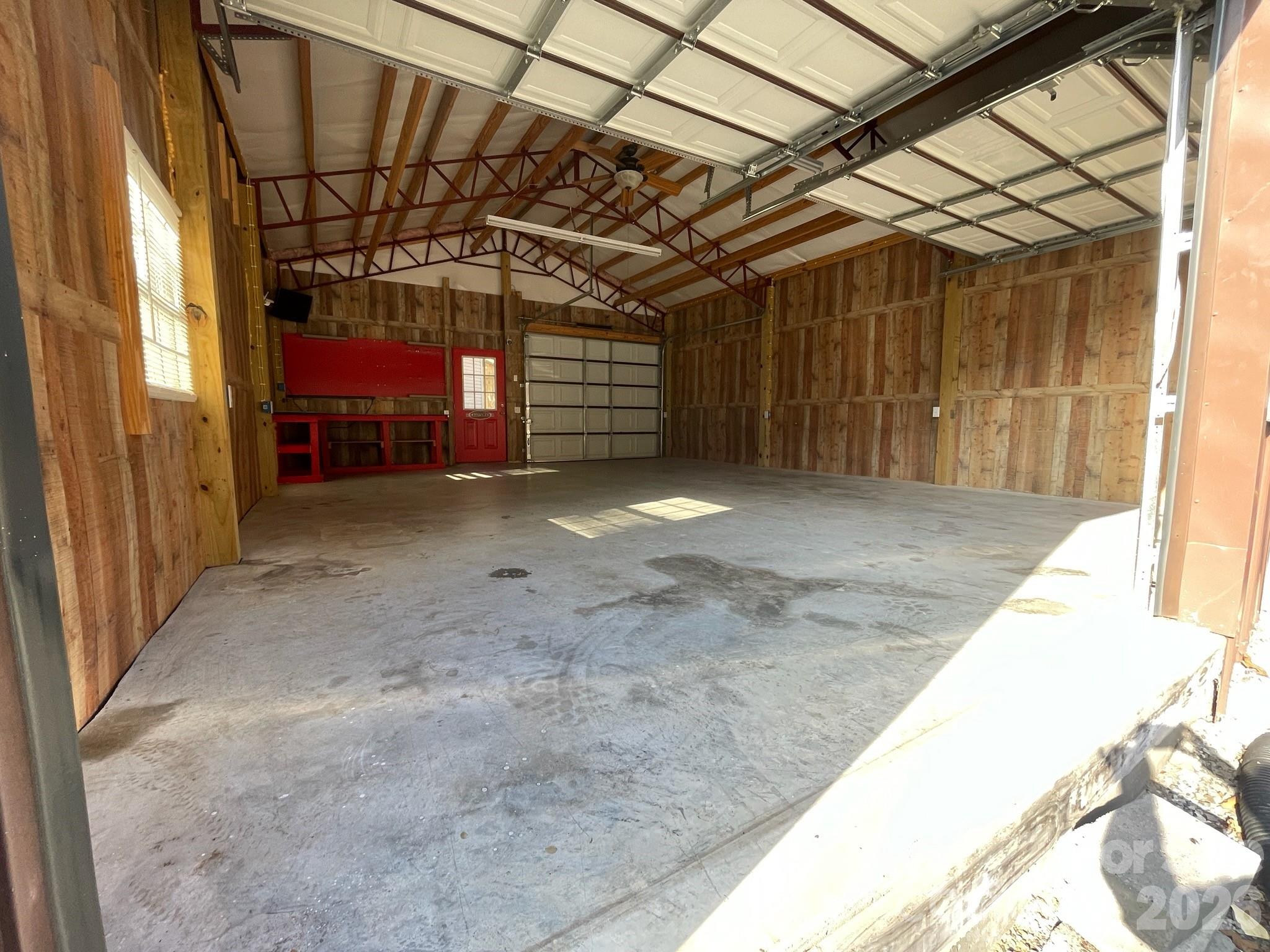 695 Johnson Farm Road Canton, NC 28716 - Photo 33 of 37 a view of empty room with wooden walls
