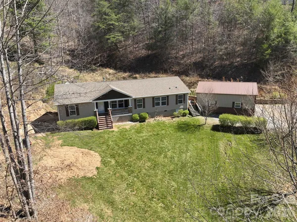 front view of a house with a yard