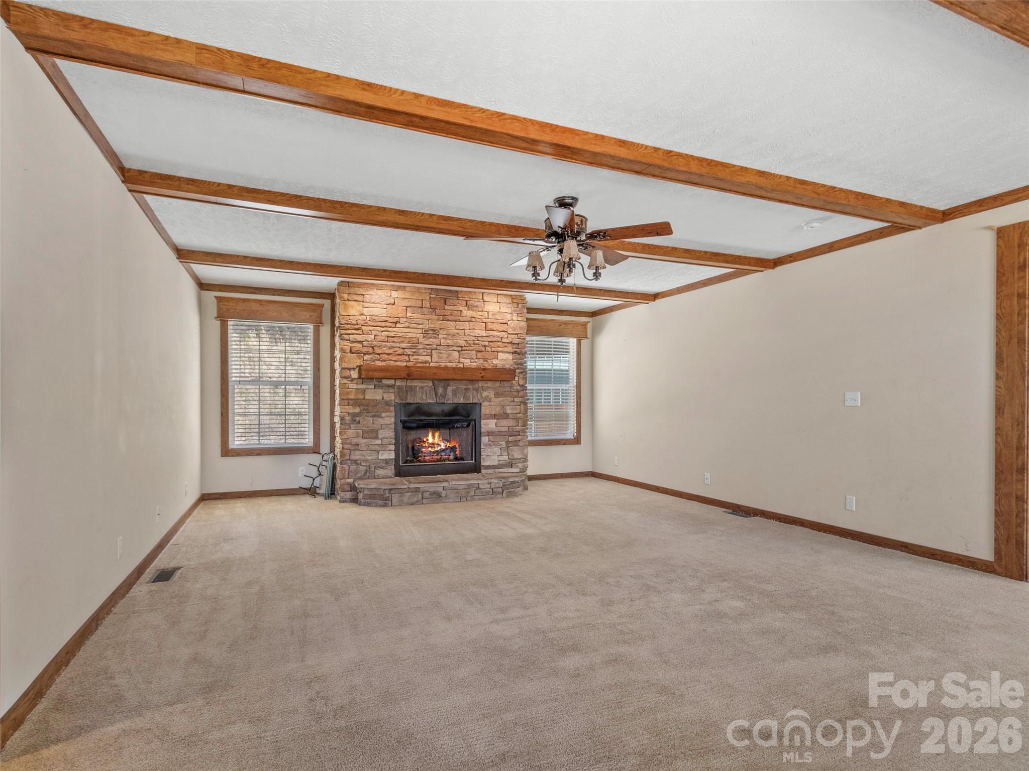 695 Johnson Farm Road Canton, NC 28716 - Photo 5 of 37 a view of an empty room with a fireplace